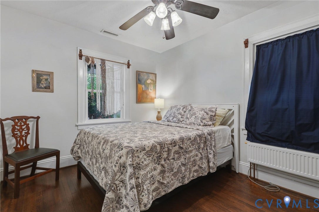 3332 Parkwood Avenue, Carytown, Richmond, VA 23221 Hardwood flooring with a white trim baseboard, white walls, and a ceiling fan with integrated lighting
