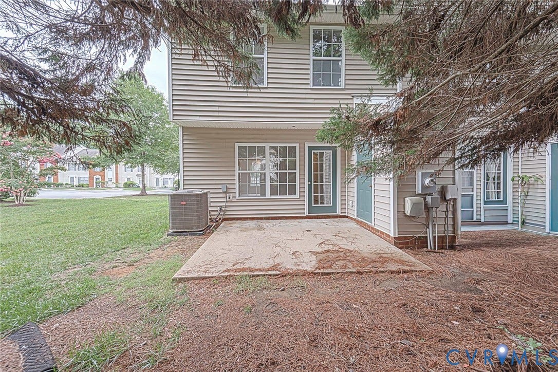 2802 Goyne Terrace, Chester, VA 23831 Rear exterior with horizontal siding and a concrete patio