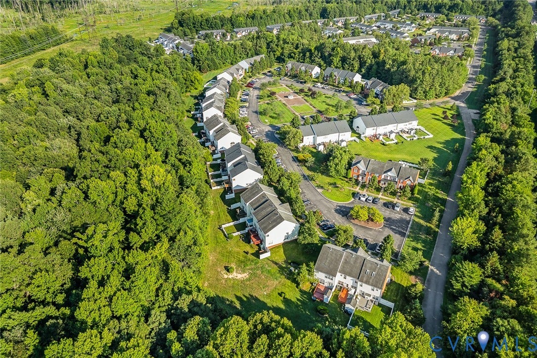 958 Wellston Court, Glen Allen, VA 23059 Aerial perspective showcasing a residential community surrounded by abundant mature trees