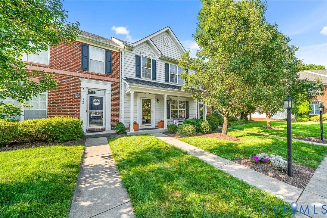 958 Wellston Court, Glen Allen, VA 23059 Two-story facade featuring brick and siding construction, a covered front porch, and mature landscaping