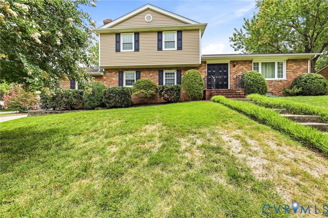 3737 Perthshire Lane, Colonial Heights, VA 23834 Split-level featuring contrasting double doors and black shutters