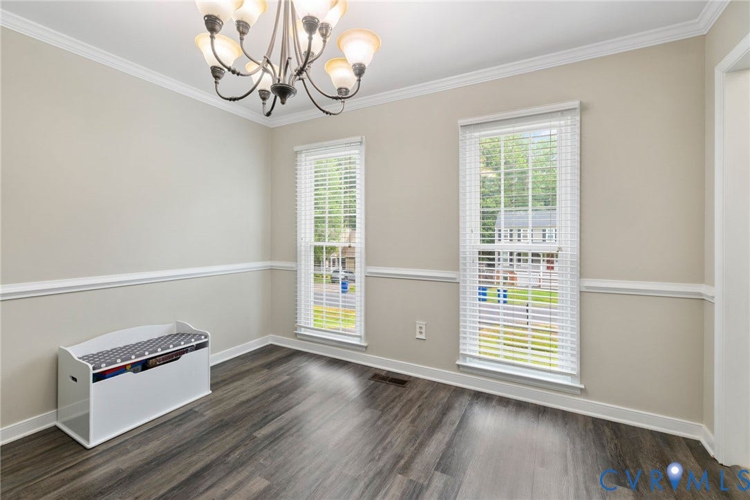 11017 Corryville Road, Brandon, North Chesterfield, VA 23236 LVP floor, crown molding, chair rail, chandelier