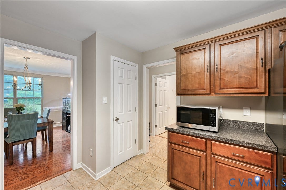 519 N Timber Tribe, Lake Anna, Mineral, VA 23117 Kitchen area featuring fresh paint, stainless steel appliances, pantry and neutral tile flooring
