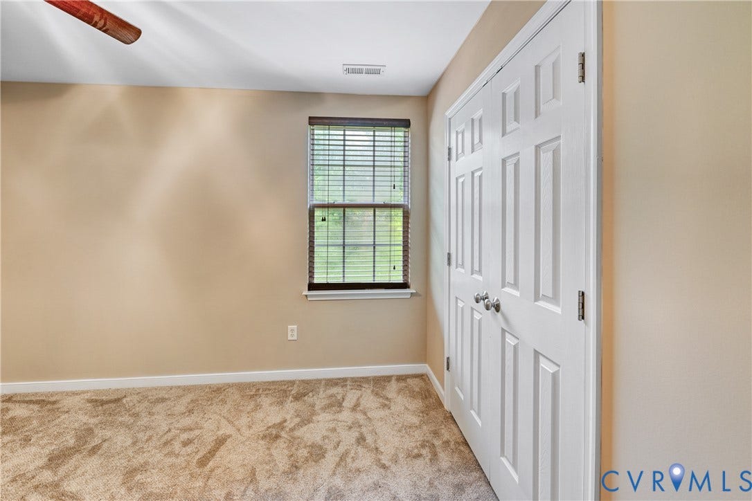 519 N Timber Tribe, Lake Anna, Mineral, VA 23117 Neutral paint complements the plush carpet flooring