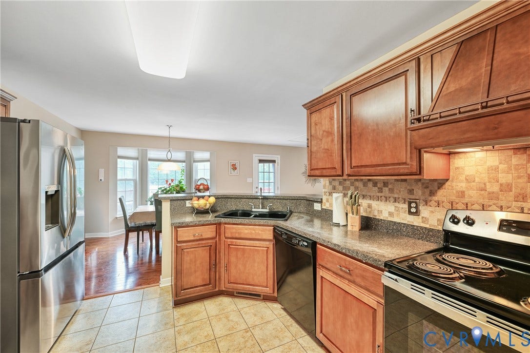 519 N Timber Tribe, Lake Anna, Mineral, VA 23117 Kitchen with stainless steel appliances, laminate countertops, tile flooring