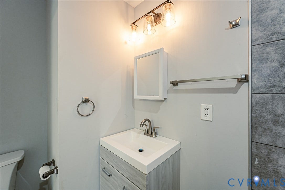 2015 Fordson Road, Richmond, VA 23229 Contemporary vanity with integrated sink and brushed nickel faucet
