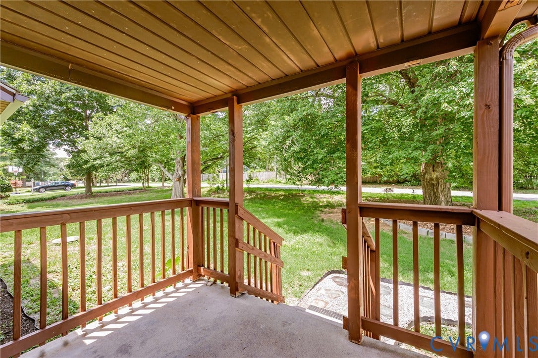 2015 Fordson Road, Richmond, VA 23229 Covered front porch featuring a wood-finish ceiling, wood-finish railing, and concrete flooring