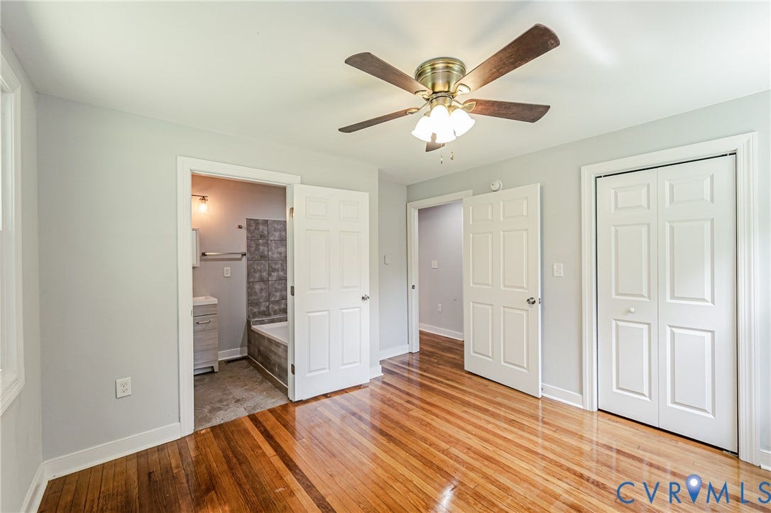 2015 Fordson Road, Richmond, VA 23229 Spacious room featuring wood-finish flooring, a ceiling fan with integrated lighting, and light-toned wall paint