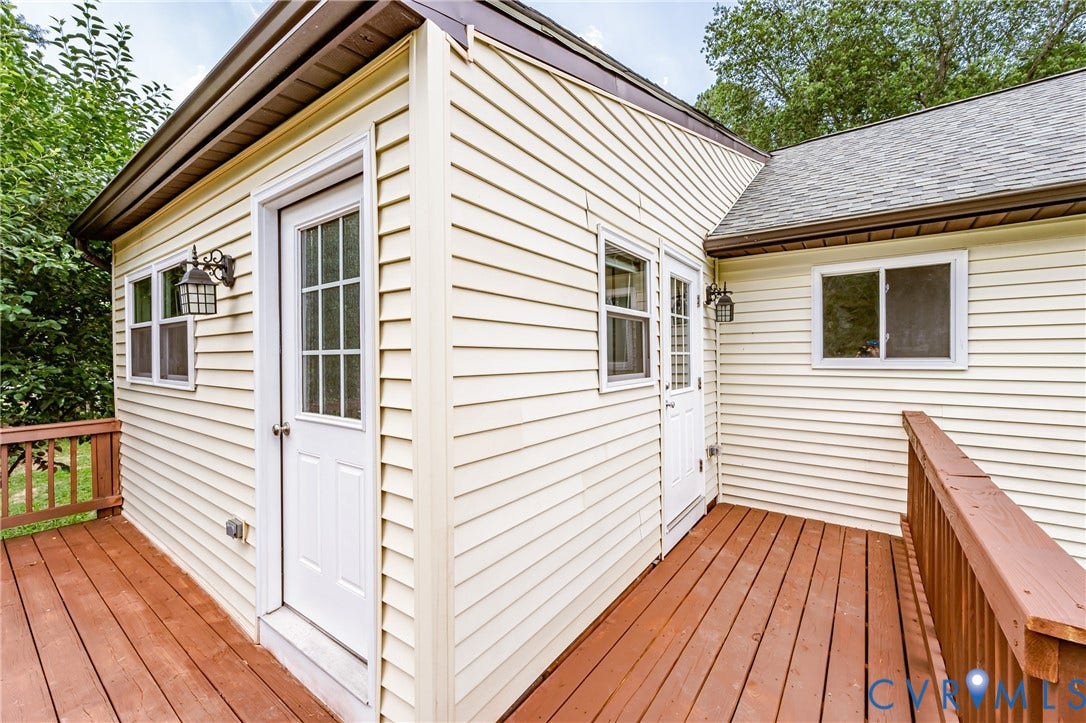 2015 Fordson Road, Richmond, VA 23229 Exterior deck with natural wood finish flooring and matching railing