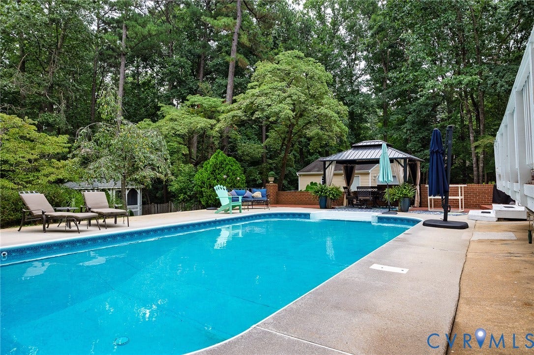 14301 Creek Stone Drive, Chesterfield, VA 23838 In-ground swimming pool with surrounding concrete decking