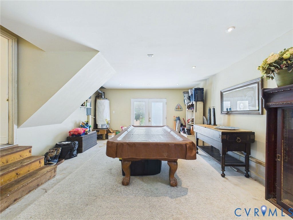 14301 Creek Stone Drive, Chesterfield, VA 23838 Lower level recreation space featuring neutral carpeting, recessed ceiling lighting, and a partial staircase
