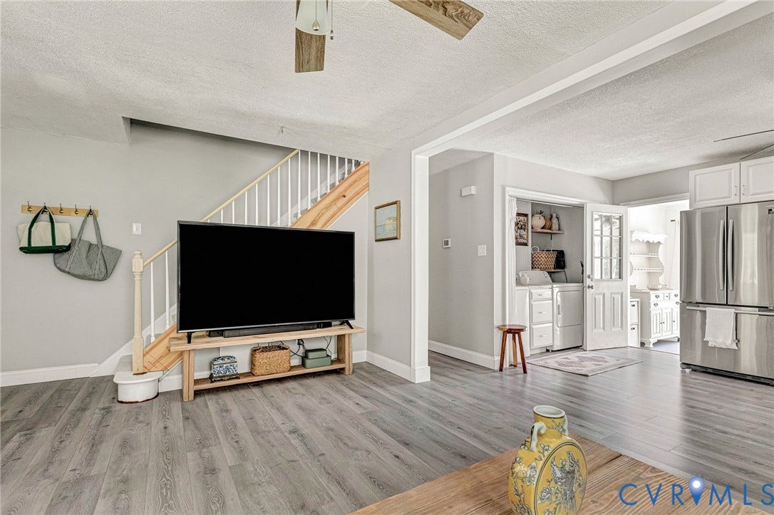 348 Forest Lane, Timberland Estates, King William, VA 23086 Open-concept living space with wood-finish flooring