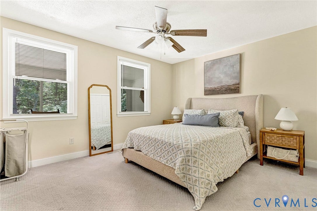 348 Forest Lane, Timberland Estates, King William, VA 23086 Neutral tone wall finish with a textured ceiling, presenting two double-hung windows with blinds