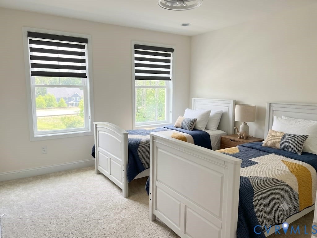 18037 Bay Point Way, Moseley, VA 23120 Carpeted room with two large windows featuring integrated blinds