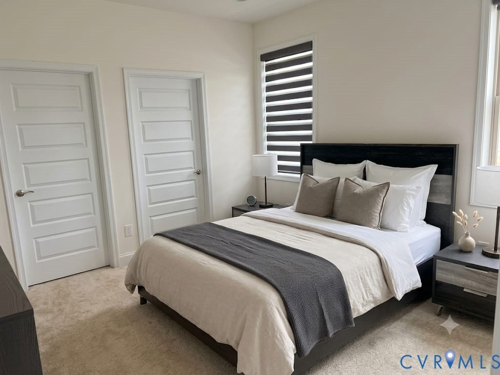 18037 Bay Point Way, Moseley, VA 23120 Carpeted bedroom featuring two paneled interior doors and a window with horizontal blinds