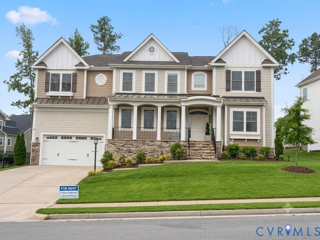 18037 Bay Point Way, Moseley, VA 23120 Two-story residence featuring a stone veneer foundation, neutral siding, and a gabled roofline