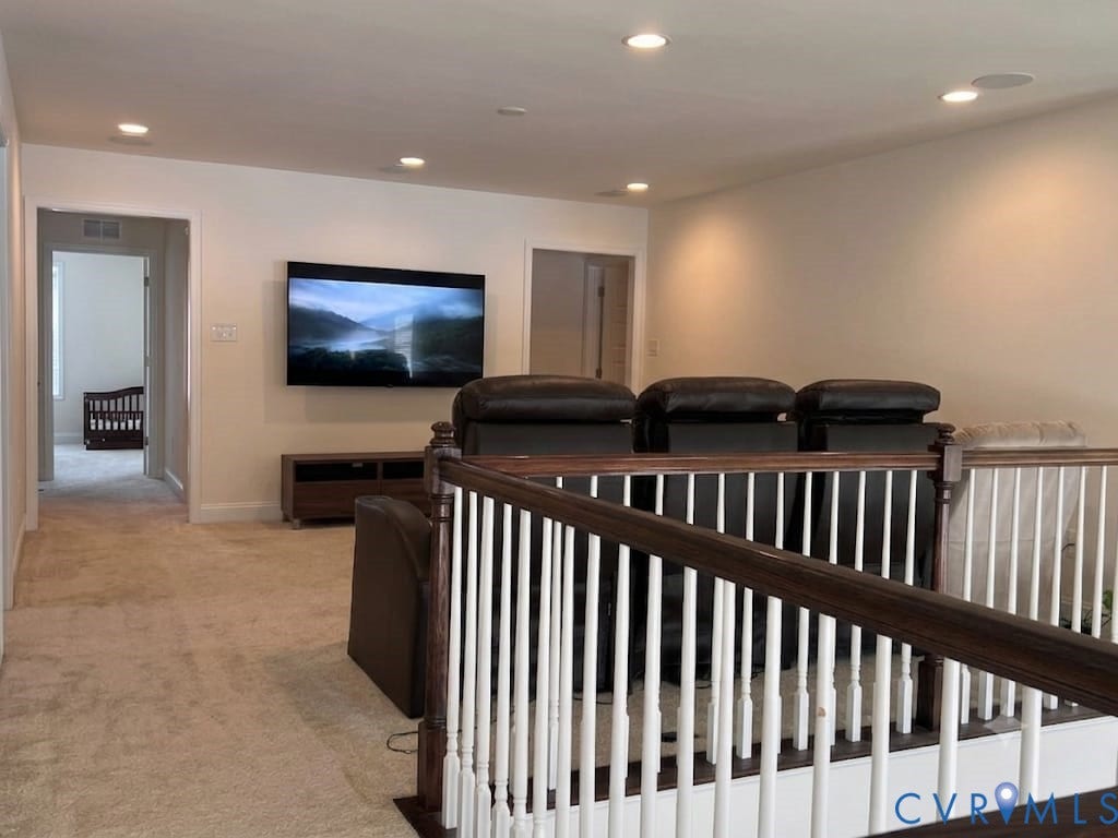 18037 Bay Point Way, Moseley, VA 23120 Upper-level landing featuring recessed lighting, carpeted flooring, and a dark wood and white spindle railing