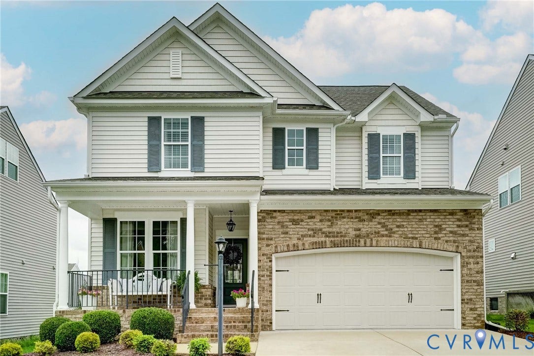 18024 Twin Falls Lane, Aston Oaks, Moseley, VA 23120 Two-story residence featuring white siding and a brick-front facade