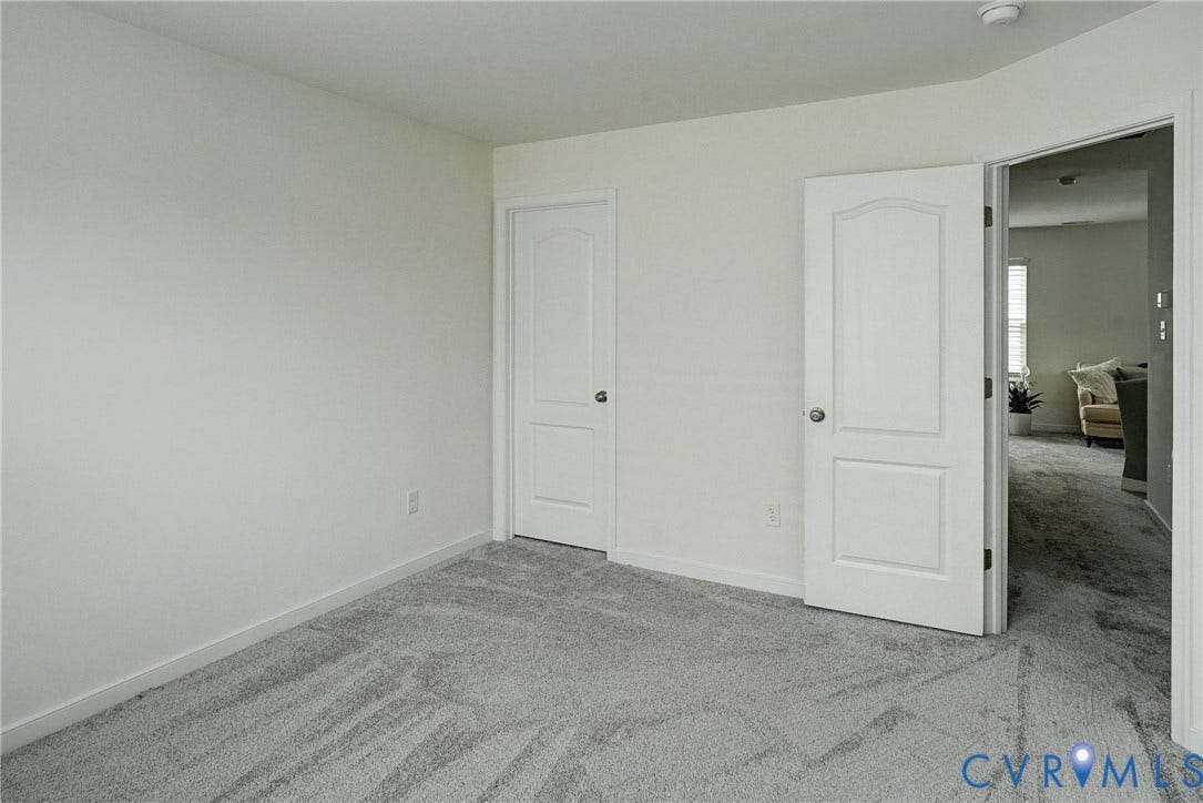 18024 Twin Falls Lane, Aston Oaks, Moseley, VA 23120 Room featuring light gray carpeting and neutral wall paint