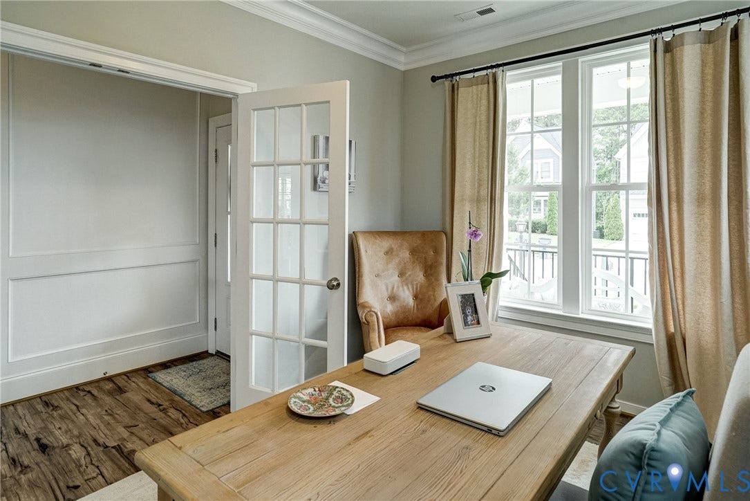18024 Twin Falls Lane, Aston Oaks, Moseley, VA 23120 French doors opening to a space featuring crown molding, wainscoting, and wood-finish flooring