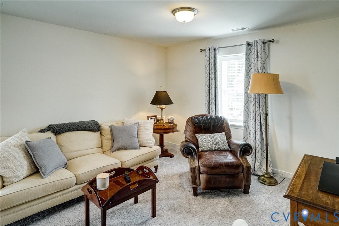 18024 Twin Falls Lane, Aston Oaks, Moseley, VA 23120 Light-colored carpeting, window with blinds, recessed ceiling light fixture, and light-toned wall finishes
