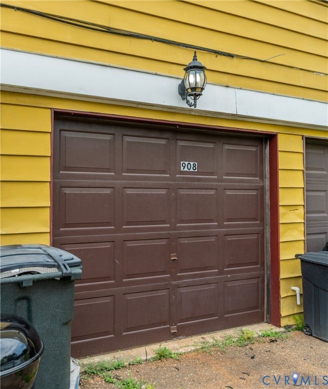 908 Winterstick Place, Highland Springs, VA 23223 Panel-style garage door with house numbers