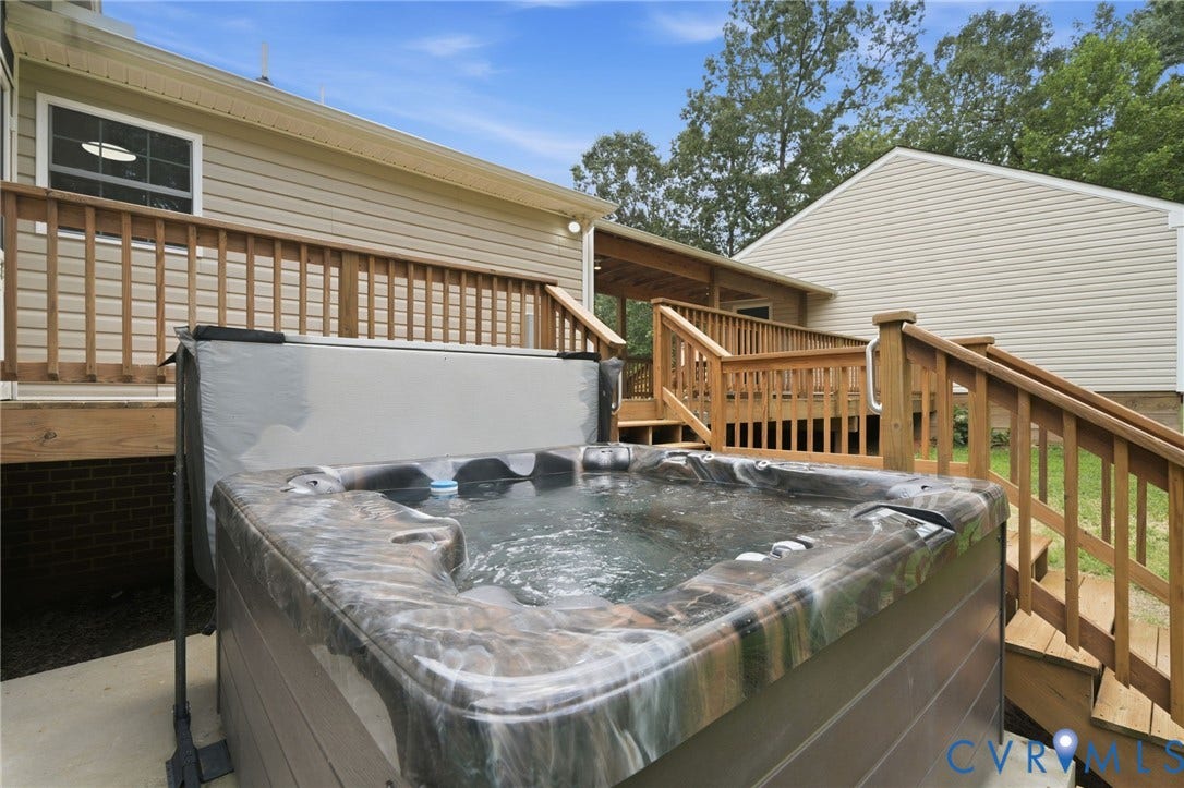 2231 Red Lane Road, Powhatan, VA 23139 Your personal retreat awaits. This peaceful setting features a luxurious 7-person hot tub w/integrated seating, soothing jets, & color-changing accent lighting, this space invites you to relax, while savoring view.