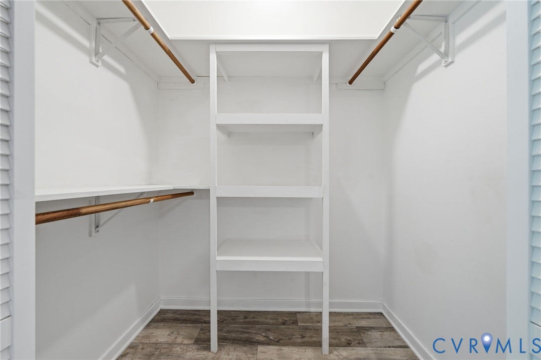 2231 Red Lane Road, Powhatan, VA 23139 Bedroom #2 - Generous walk-in closet w/custom shelving, multiple hanging rods, & abundant storage for effortless organization.