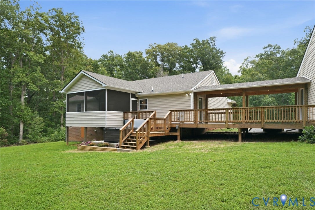 2231 Red Lane Road, Powhatan, VA 23139 Imagine ending each day in this extraordinary outdoor sanctuary, where the porch, deck, & hot tub, & lawn come together to create a seamless connection to nature. Surrounded by peaceful wooded views, this is more than a backyard, it's a lifestyle.