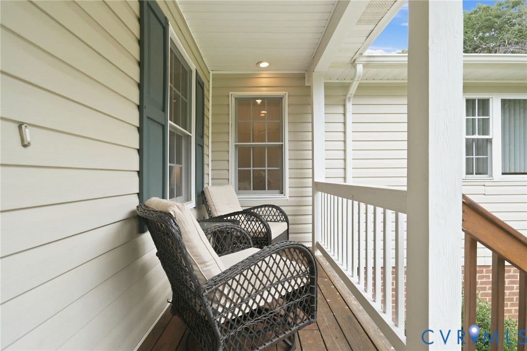 2231 Red Lane Road, Powhatan, VA 23139 Relax & unwind on the charming covered front porch, beautifully highlighted by double-hung windows, low-maintenance vinyl siding, & recessed lighting.