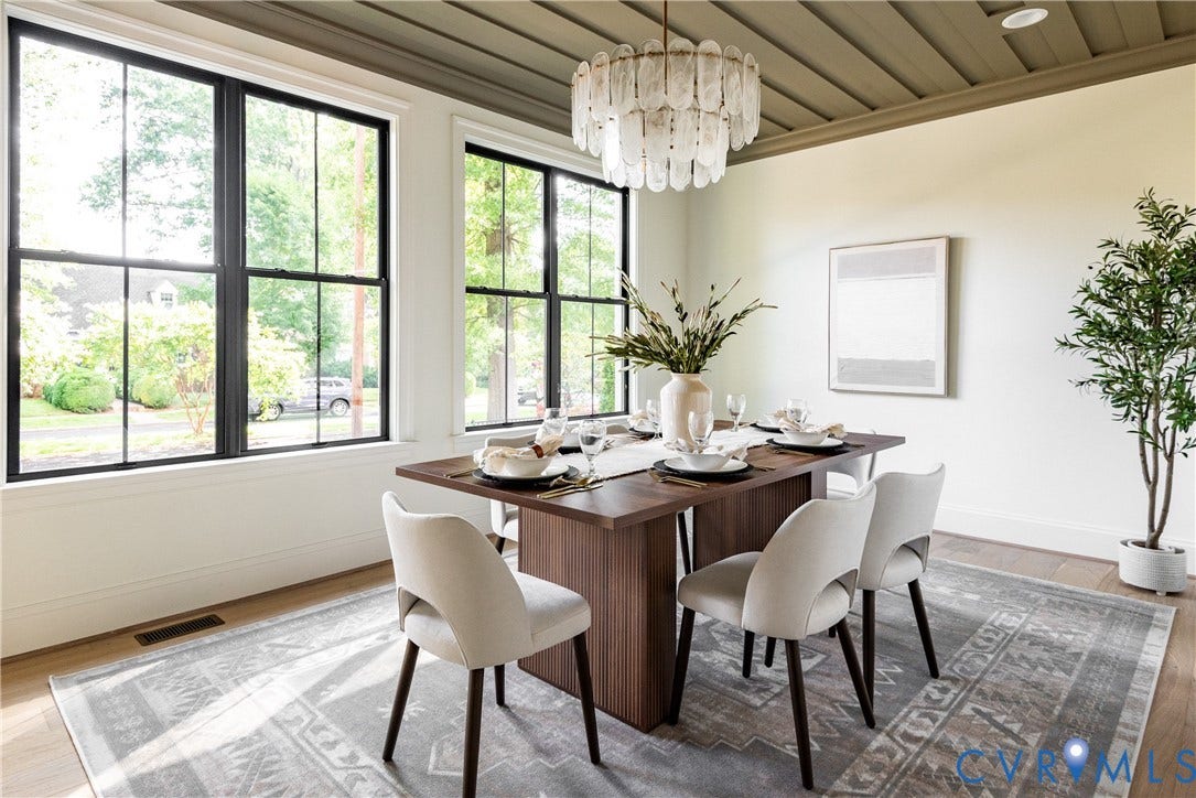 4507 Leonard Parkway, Richmond, VA 23221 Dining area featuring abundant natural light from multiple large windows, wood-finish flooring, and a unique textured ceiling