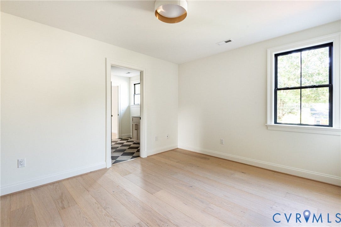 4507 Leonard Parkway, Richmond, VA 23221 Light wood-finish flooring complemented by white walls and baseboards