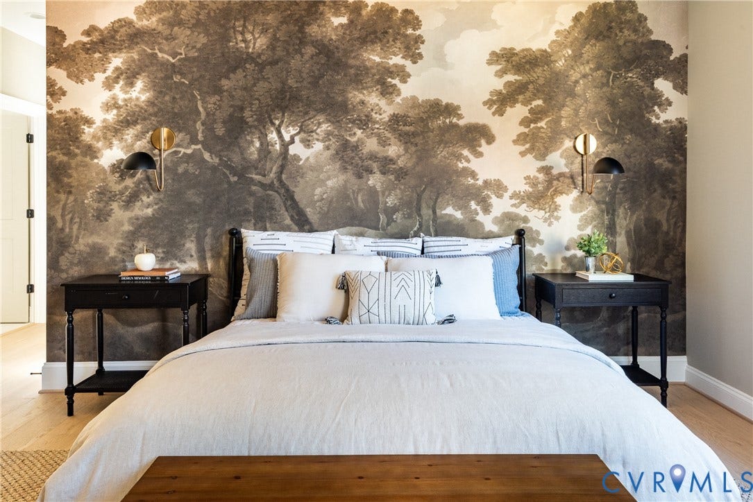 4507 Leonard Parkway, Richmond, VA 23221 Feature wall with scenic wallpaper, complemented by matching sconces