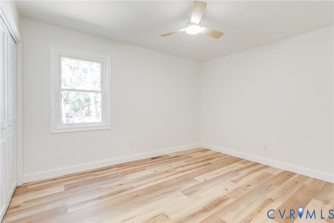 Light-filled bedroom with flexibility for guests, family, or personal use