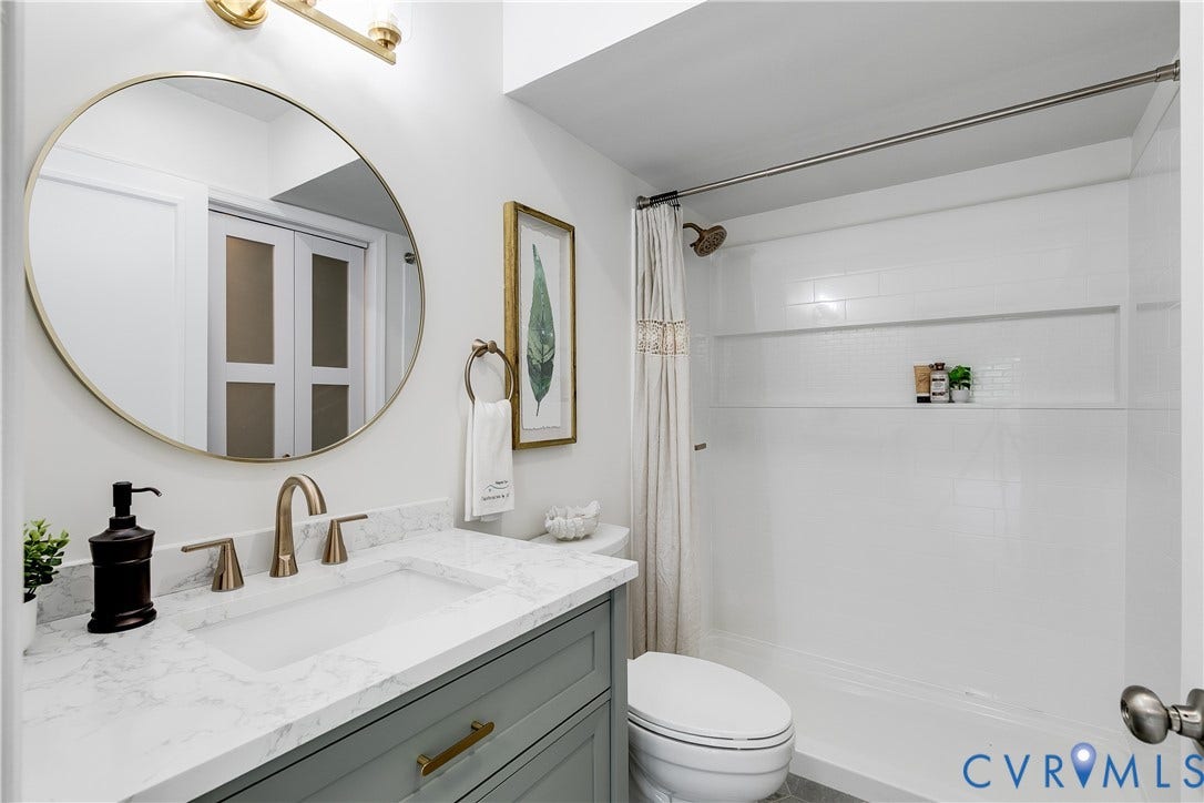 Full downstairs bathroom with step-in shower