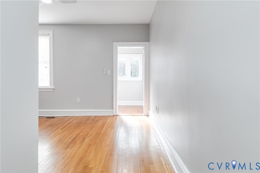 Kitchen features a back door entry.