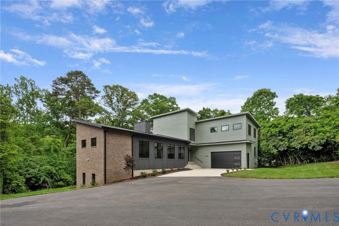 7301 Riverside Drive, Richmond, VA 23225 Modern architectural design featuring varied facade materials including brick and light green siding