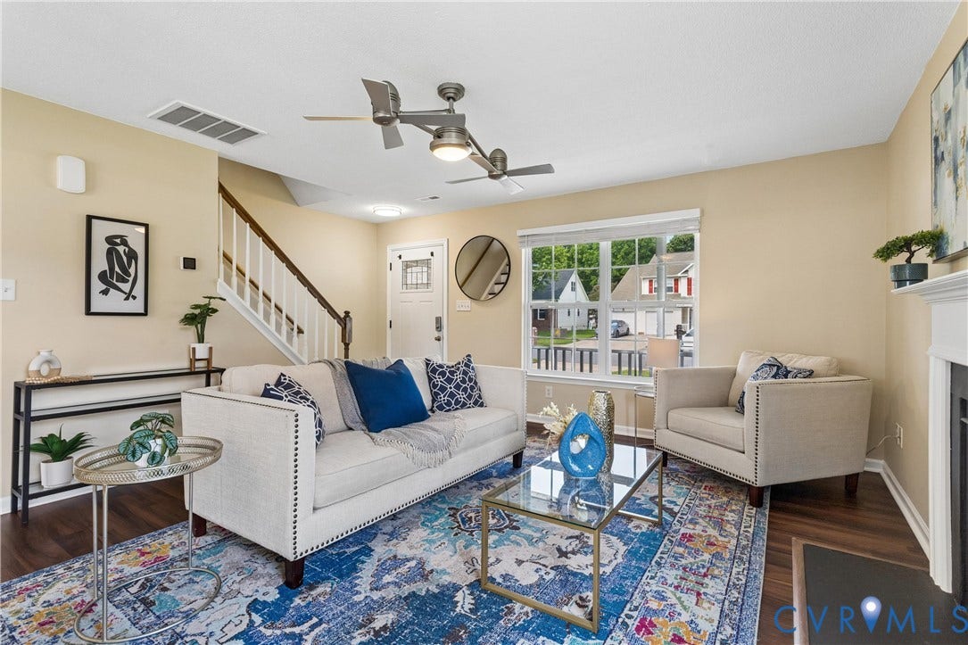 21 St Johns Drive, Hampton, VA 23666 Living area featuring wood-finish flooring, a white trim window, and dual ceiling fans