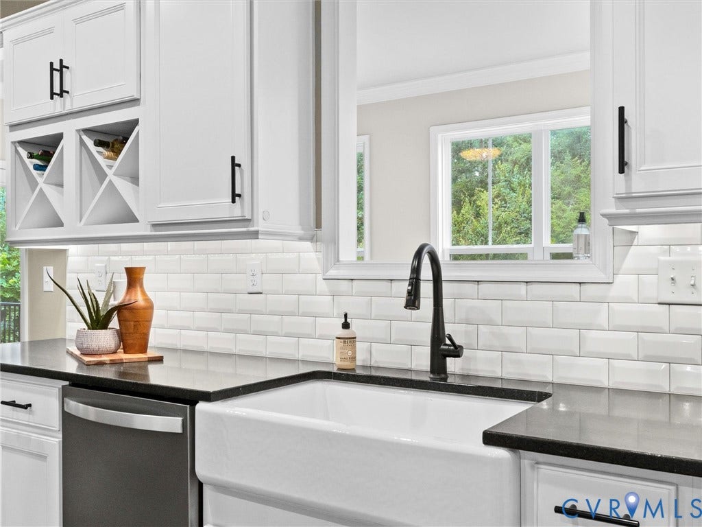 16701 Laurel Park Drive, Moseley, VA 23120 White farmhouse sink with a matte black gooseneck faucet