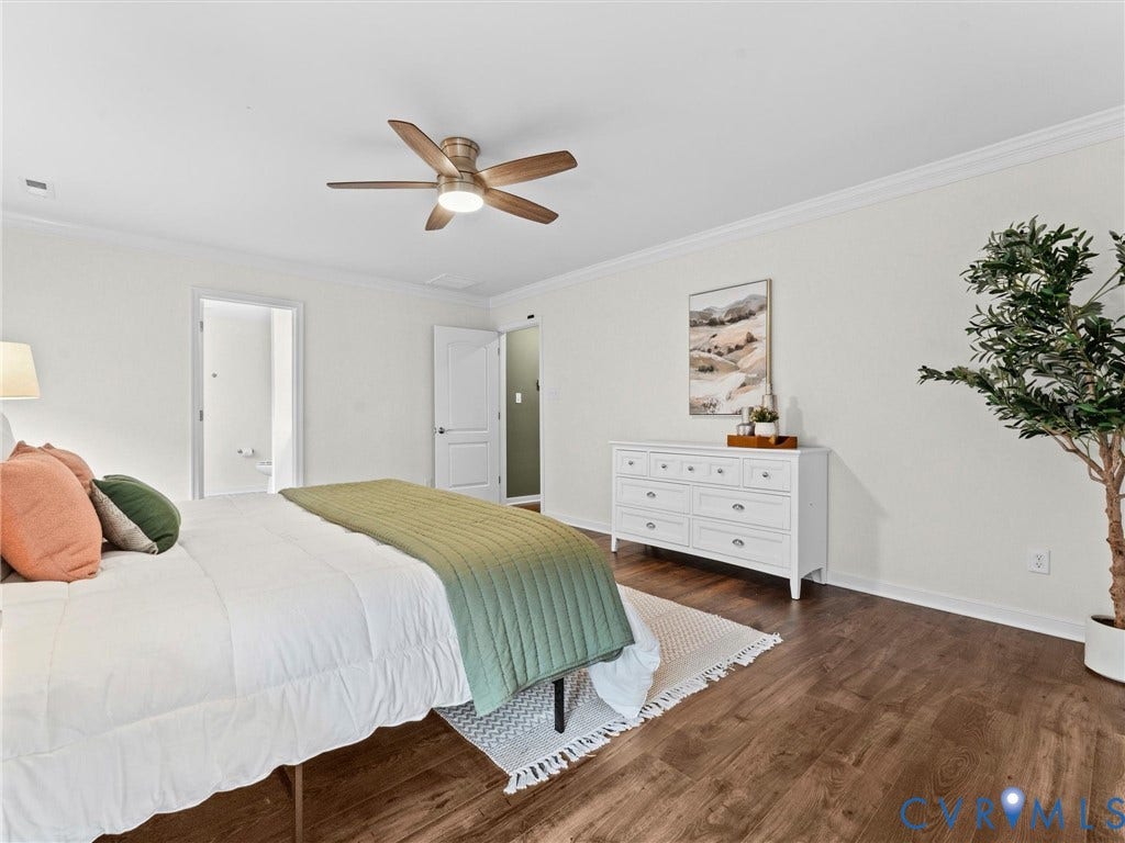 16701 Laurel Park Drive, Moseley, VA 23120 Spacious room featuring wood-finish flooring, white walls, and a ceiling fan with integrated lighting
