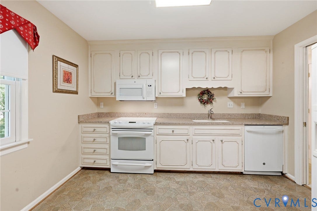 121 Huntington Road, Colonial Heights, VA 23834 Kitchen featuring white cabinetry, light-toned countertops, a built-in microwave, an electric range, and a dishwasher