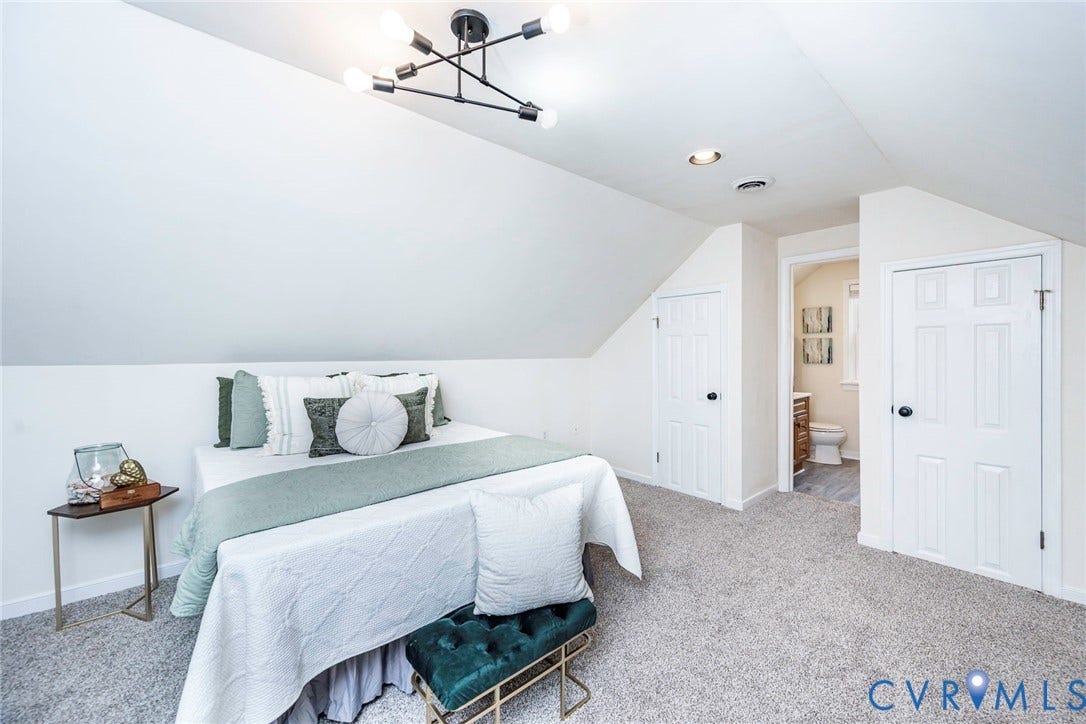 1402 Rhode Island Avenue, Glen Allen, VA 23060 Slanted white walls featuring a modern ceiling light fixture and recessed lighting