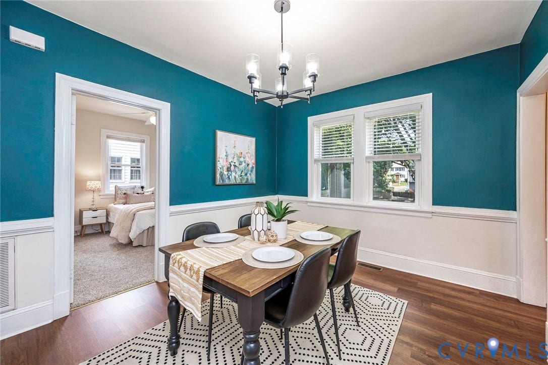 1402 Rhode Island Avenue, Glen Allen, VA 23060 Dining area featuring wood-finish flooring, white baseboards, and a two-tone wall treatment