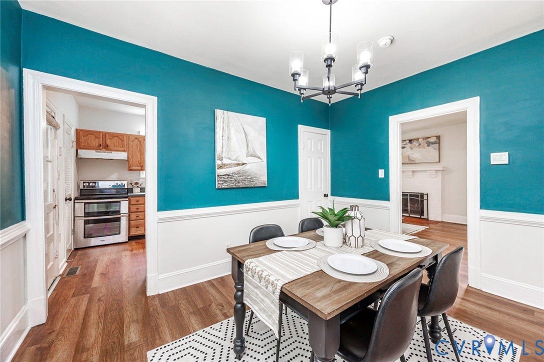 1402 Rhode Island Avenue, Glen Allen, VA 23060 Dining space featuring wood-finish flooring, wainscoting, and a multi-arm chandelier