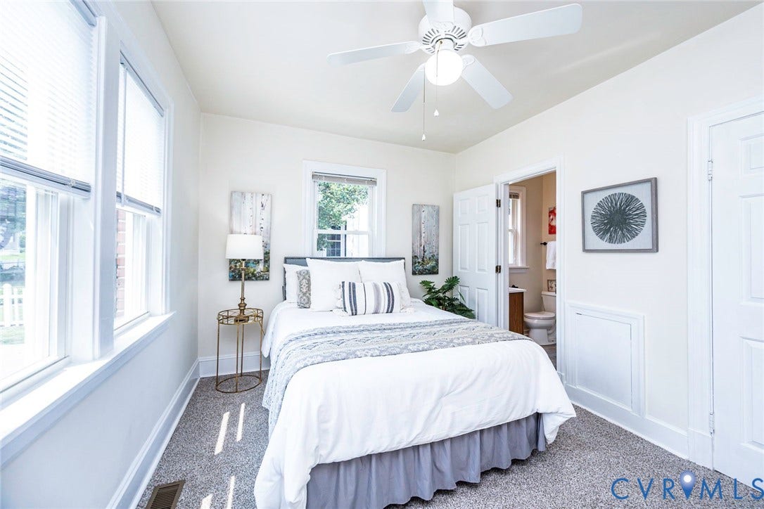 1402 Rhode Island Avenue, Glen Allen, VA 23060 Carpeted bedroom featuring multiple windows with blinds, a ceiling fan with integrated lighting, and white trim