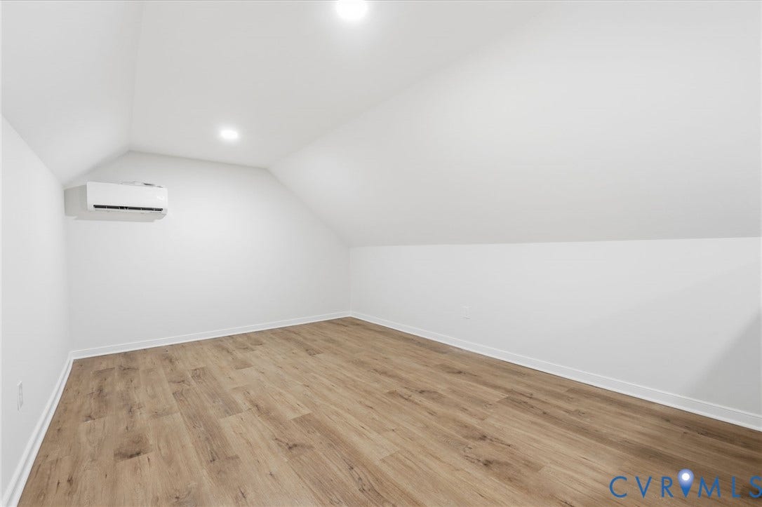 3700 Malbon Way, Chesterfield, VA 23832 Attic room featuring a vaulted ceiling and wood-finish flooring