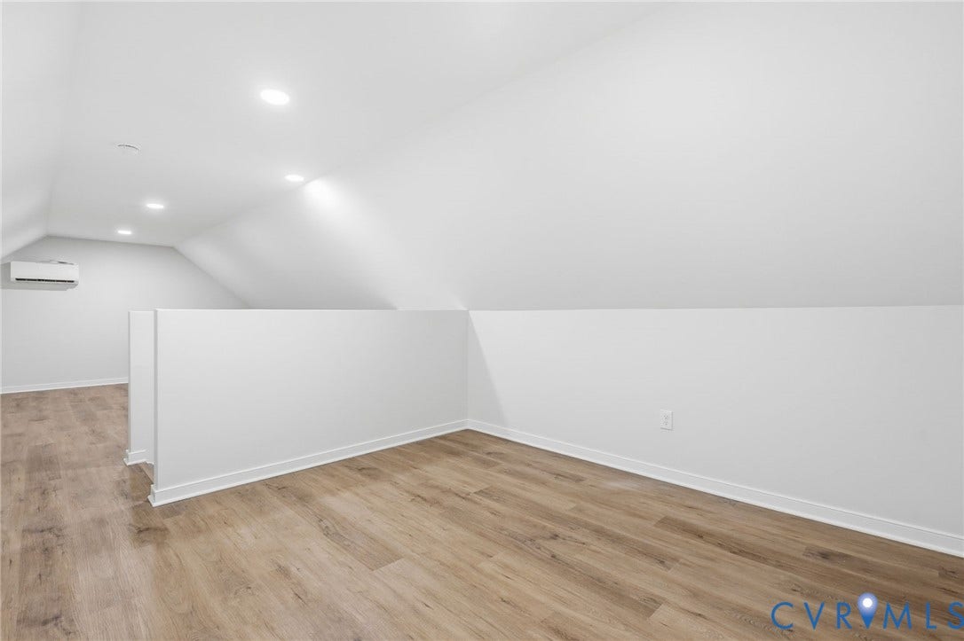 3700 Malbon Way, Chesterfield, VA 23832 Open loft space featuring wood-finish flooring, recessed lighting, and a white wall-mounted mini-split unit