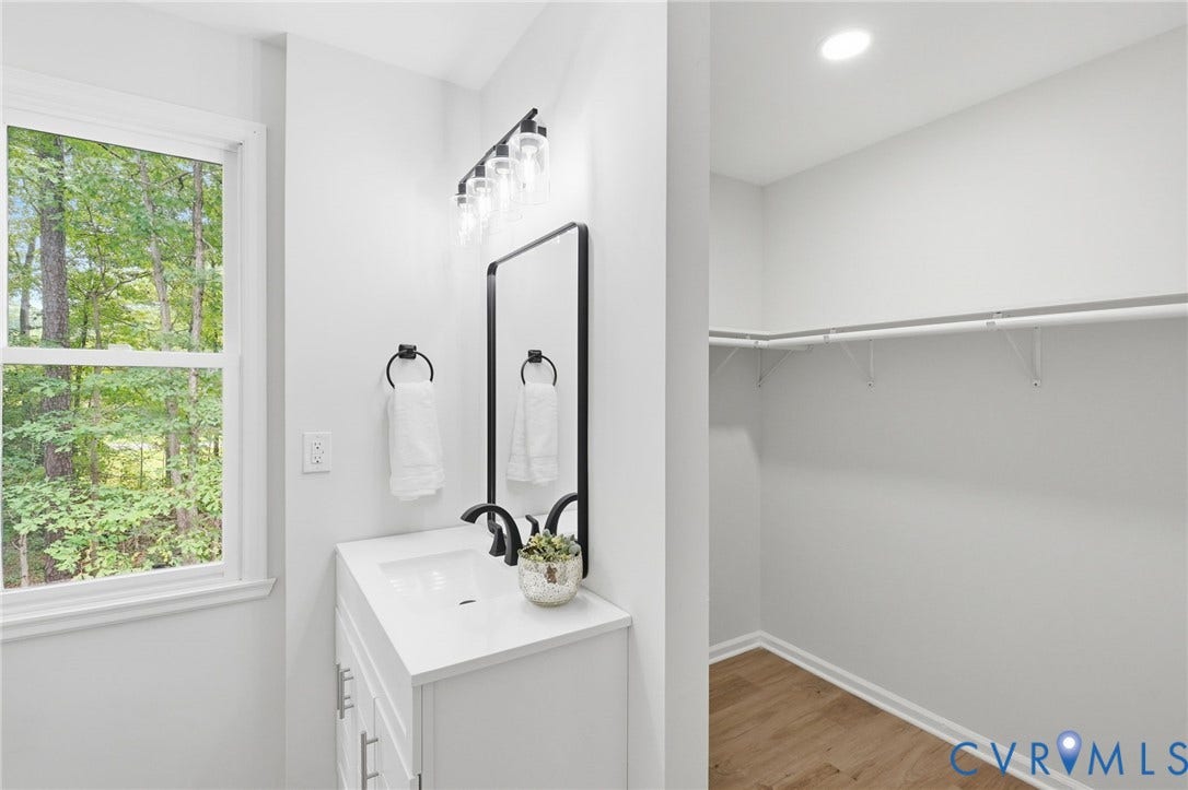 3700 Malbon Way, Chesterfield, VA 23832 Vanity with white cabinetry, integrated sink, and black hardware