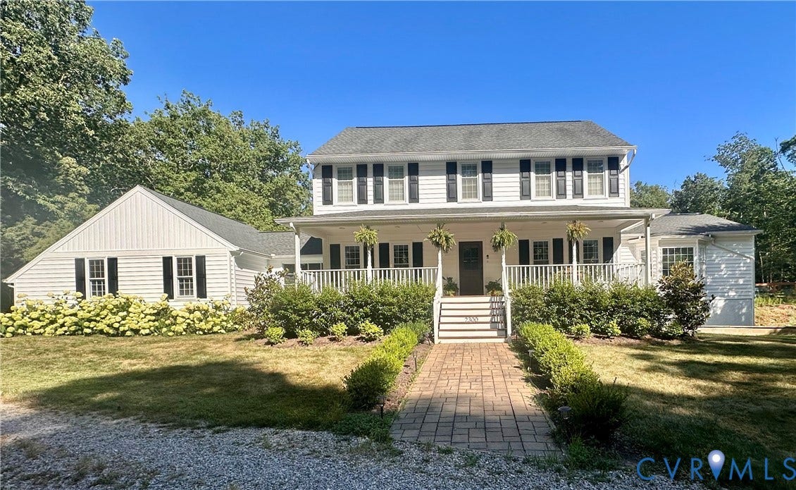 2300 Judes Ferry Road, Powhatan, VA 23139 Two-story home with white siding and black shutters