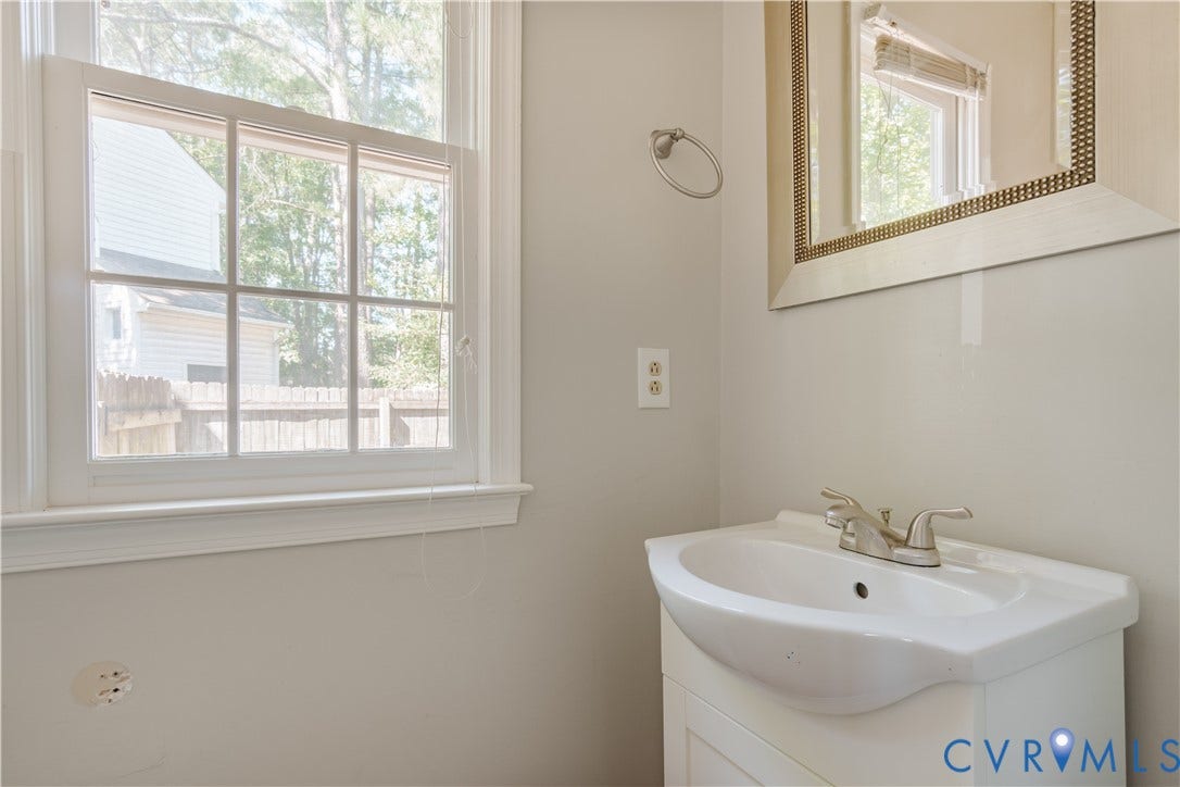 Powder room of side entry off front porch